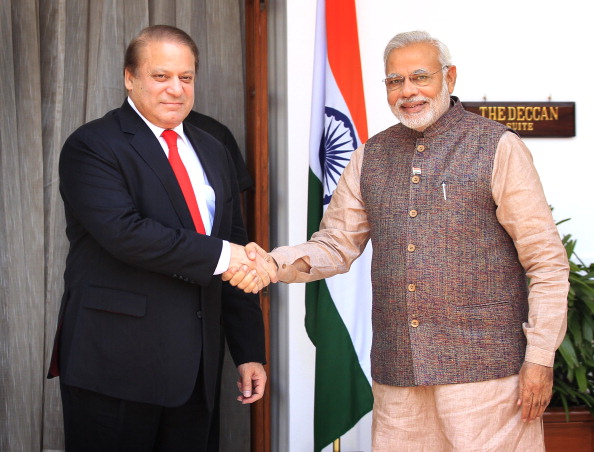 NEW DELHI, INDIA - MAY 27: Indian Prime Minister Narendra Modi (L) shakes hand with his Pakistani counterpart Nawaz Sharif before the start of their bilateral meeting at Hyderabad House on May 27, 2014 in New Delhi, India. New Indian Prime Minister Narendra Modi met with the leaders of rival Pakistan and other neighboring nations a day after being sworn in. (Photo by Ajay Aggarwal/Hindustan Times via Getty Images)